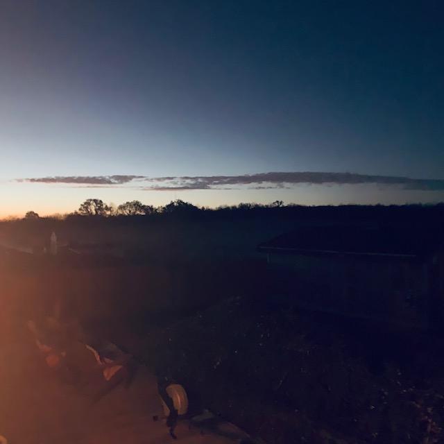 I took Ethel out back to do potty early this morning and this cloud was spread all over the Eastern sky before sunrise.