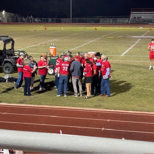 A team huddle before leaving the field at halftime.