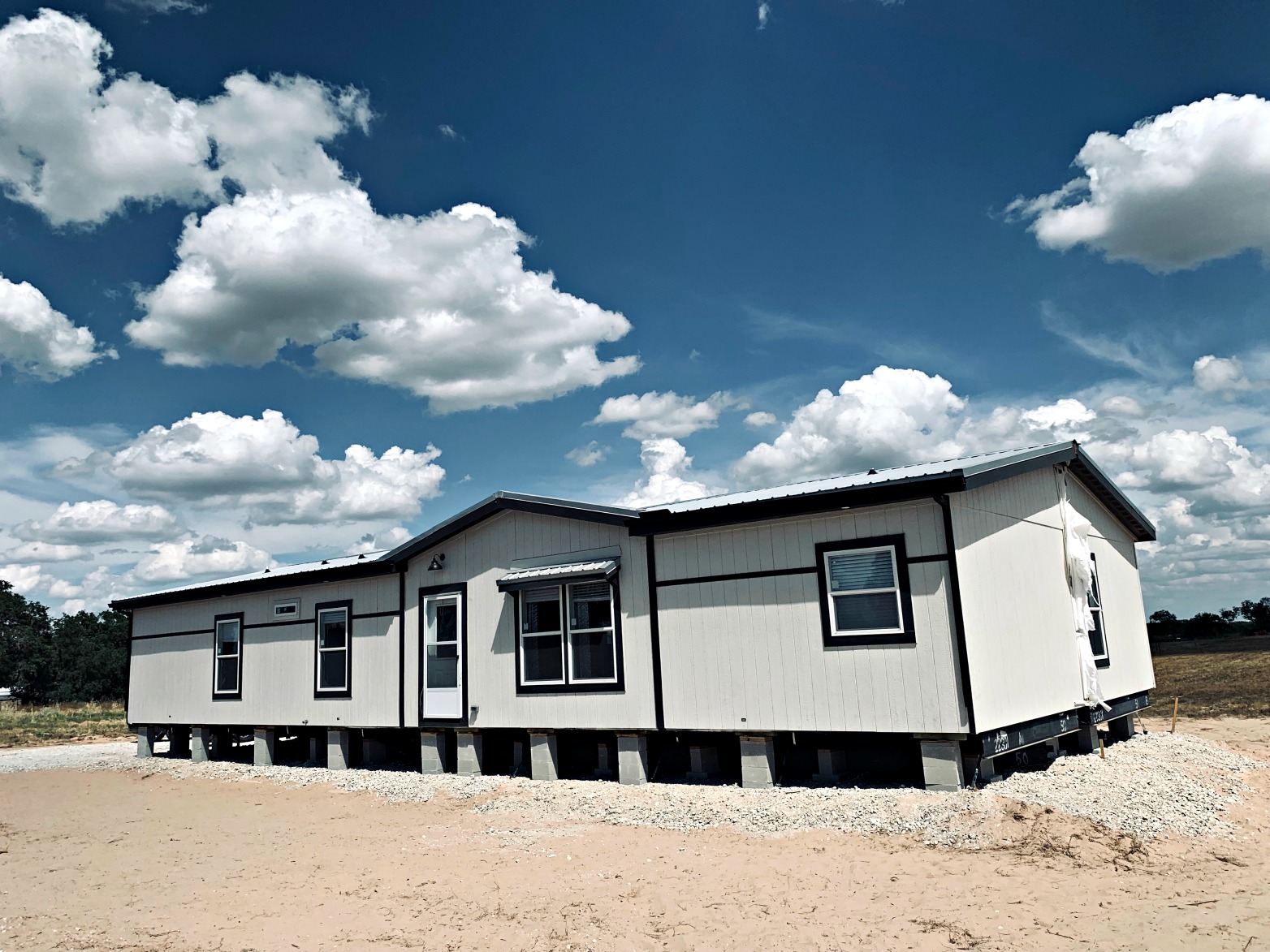 Here is our beautiful new family farm home. It is a manufactured home, still being worked on for weeks to come.