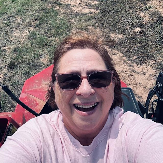 I just couldn't resist getting on the tractor.