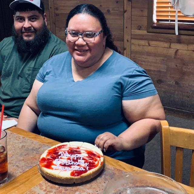 Eddy and Angelica with the cheesecake. Happy Birthday!