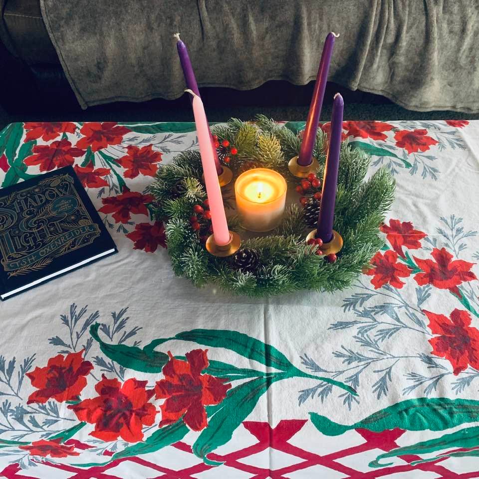 Here is my Advent table. I use a Christmas tablecloth that belonged to my grandmother, Elvina Yorgensen. It graced her Christmas Eve table each year when I was a girl.