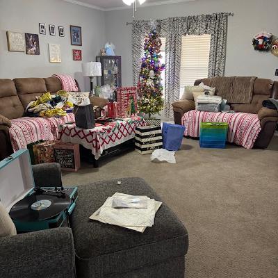 Usually, I clean up right away but not this year. Here is the aftermath in my living room. It was a good Christmas.