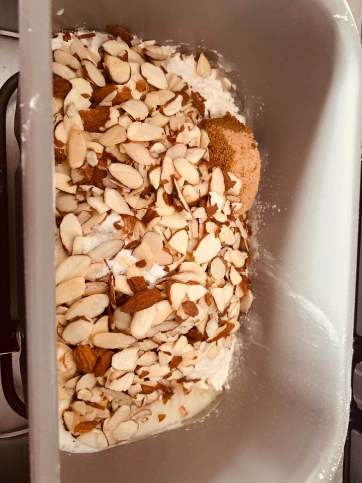 Slivered almonds are on top of all of the other ingredients.