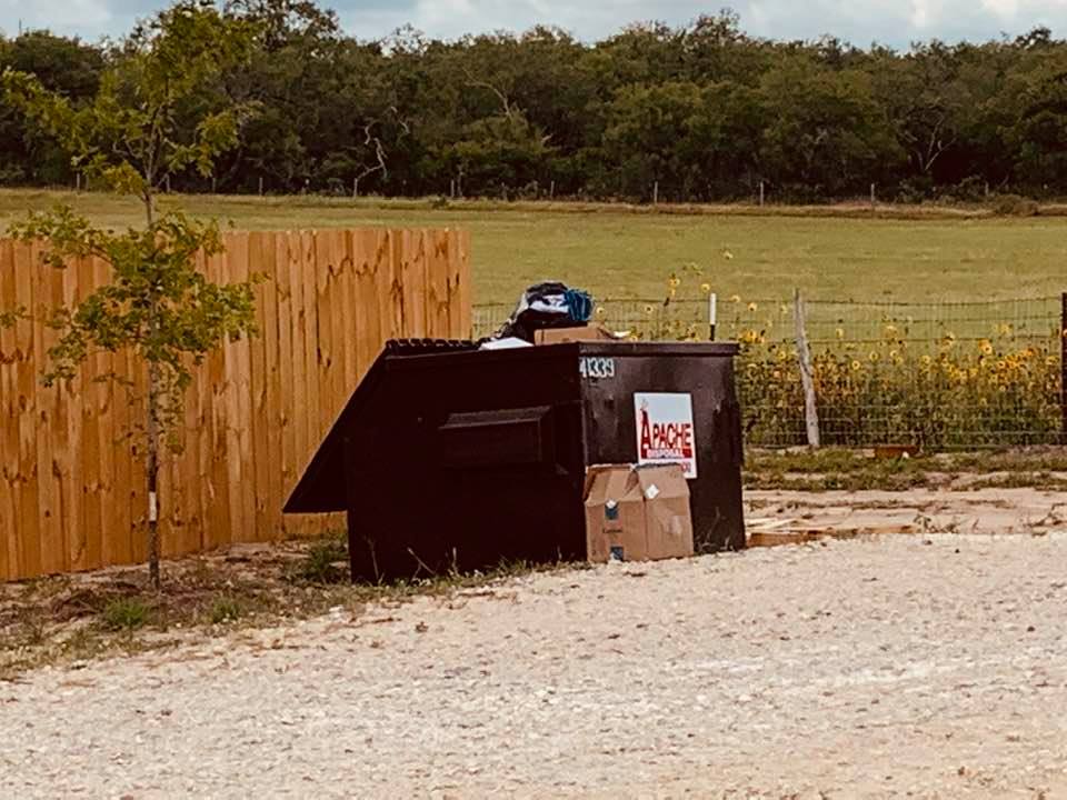 Here is our almost full and a bit overflowing dumpster. It is Wednesday afternoon. I hope he decides to bless us and dump our trash as we have family coming in Friday afternoon and Saturday.