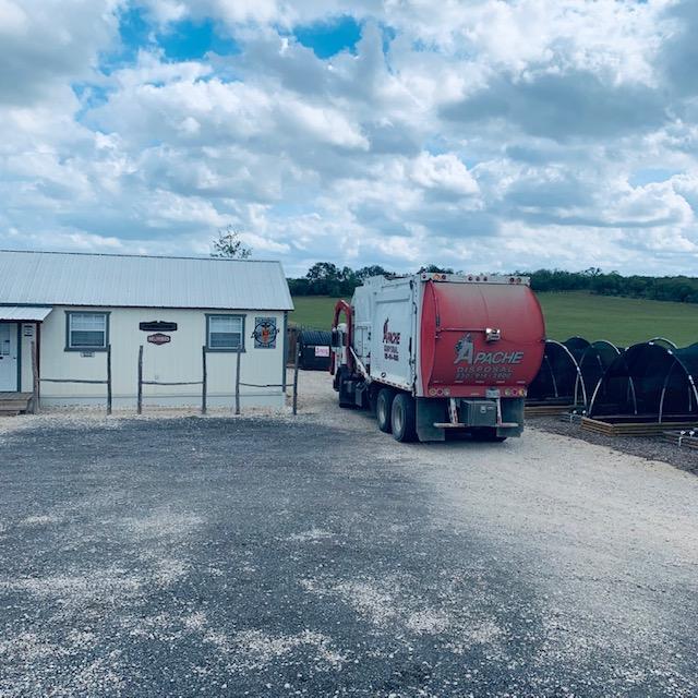 The Apache Disposal truck came and got the trash. They took the dumpster off of the landscaping but did not fix what he wrecked a week ago.