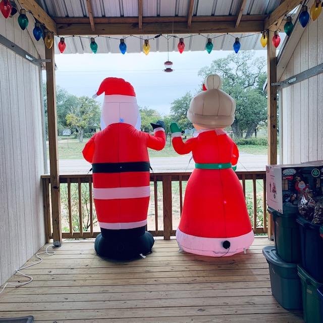 And Santa is back with his wife now, happily waving to all of the passersby.