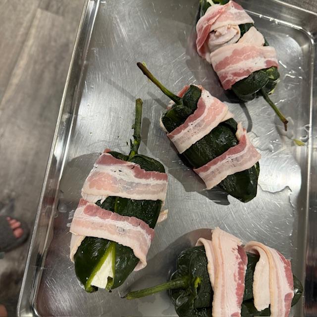 We wrapped the stuffed peppers with bacon and then dipped them in flour and batter.