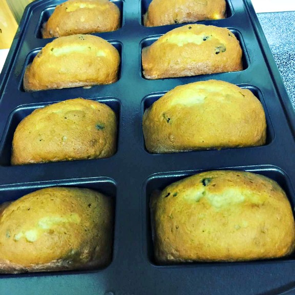 A pan full of mini banana bread loaves that I recently baked. I wrapped them and sent them home with guests.
