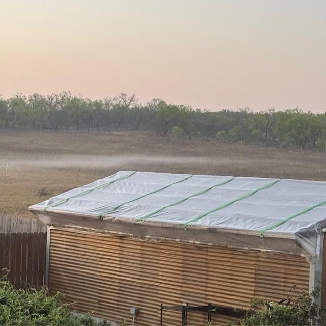 Earlier, there was a small band of fog in the field.