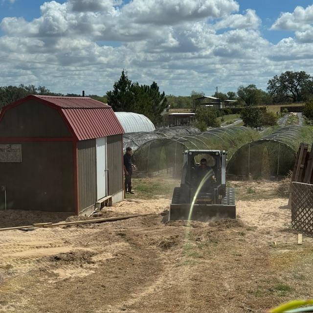They had to take off the wooden skirting before pulling the shed out.