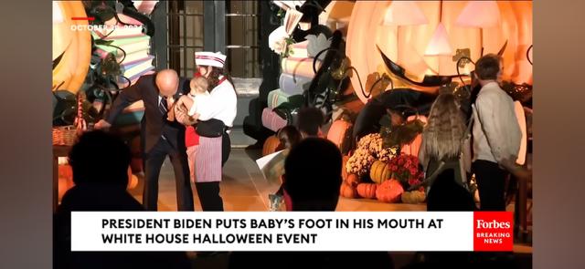 Why is this clown biting babies on the legs and eating their feet?