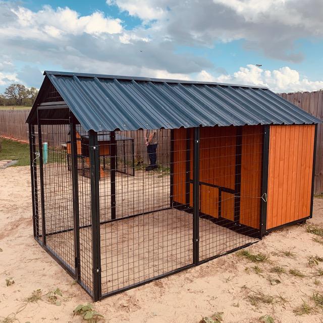 You can see our 2 new chick coops in this photo.