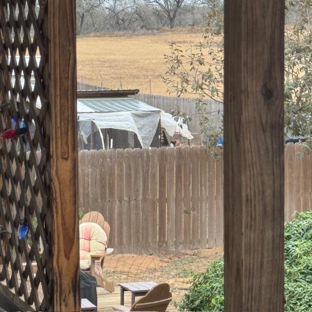 Welcome to a bleak, windy, chilly, grey day. See the plastic on the chicken coop blowing up in the wind. It's been keeping the chickens warm during the cold spell.