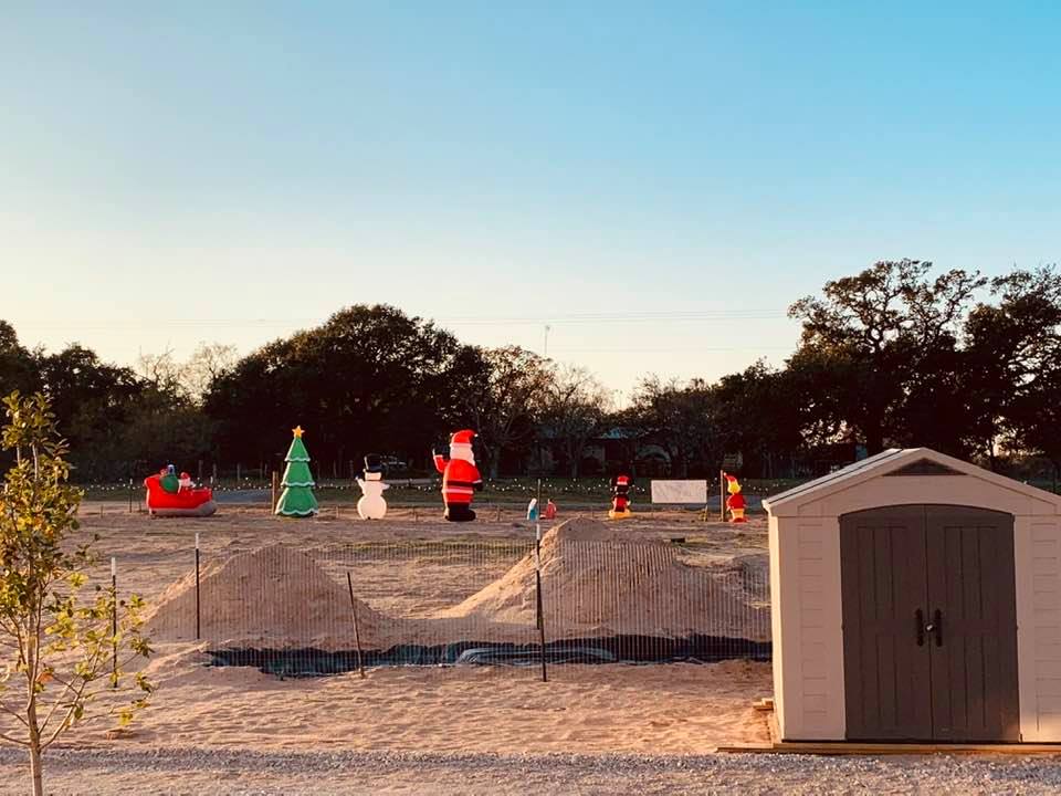 Our 6 blowups from the side deck. The little building is our well house.