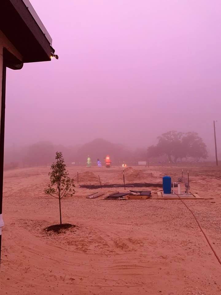 It was foggy again on the farm this morning. This shows the front of our property with some Christmas blowups.