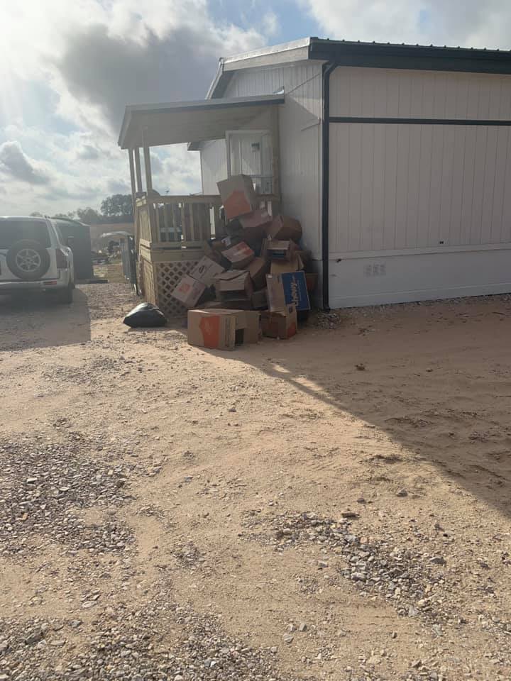 Just a few of the boxes we have emptied and thrown outside.