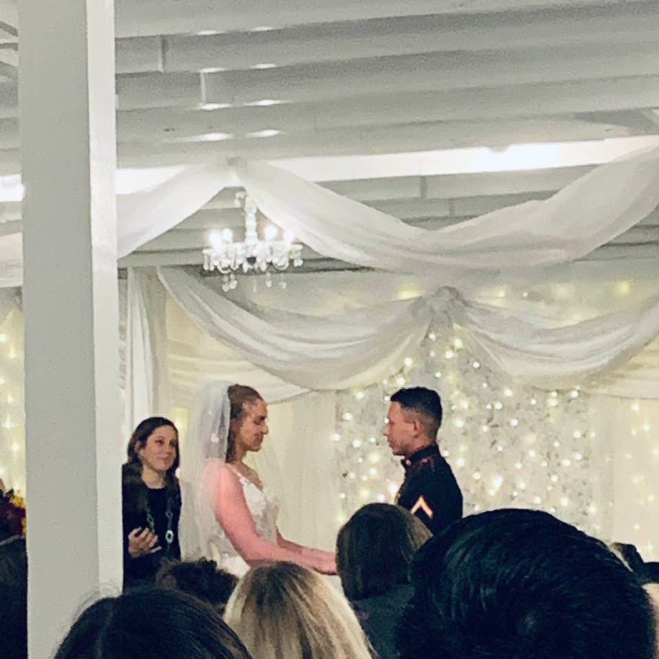 The bride and groom during the ceremony. We all have happy new year wishes for them.