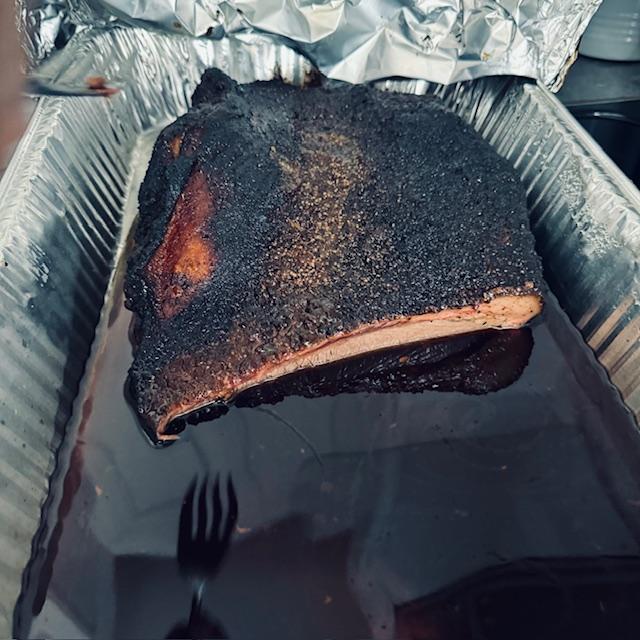 This is about half of the brisket. I forgot to take a photos before David started cutting it.