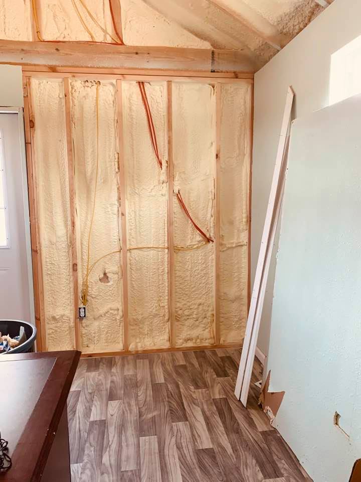 This is the part of the wall in building 2 where the sheet rock had to be removed to fix the electricity. This was the factory's fault. It will cost a fortune to fix.