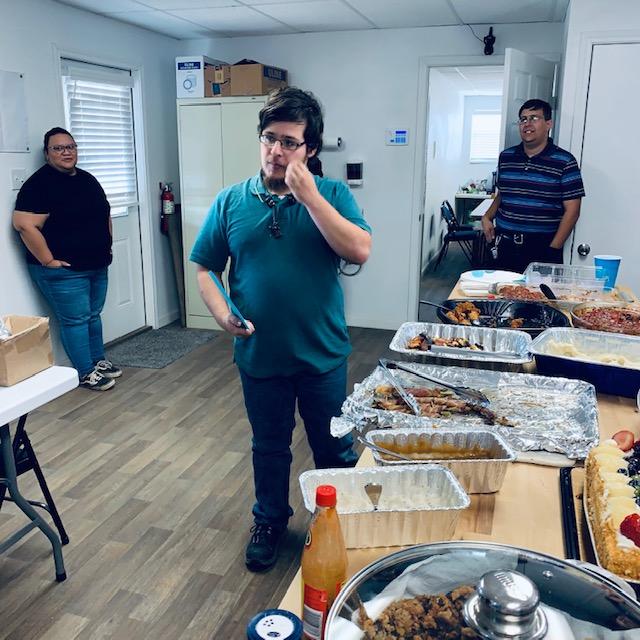 Caleb is by the food while we sing to him. Angelica is to the left. His brother Brendon is to the right. Caleb is by the food while we sing to him. Angelica is to the left. His brother Brendon is to the right.