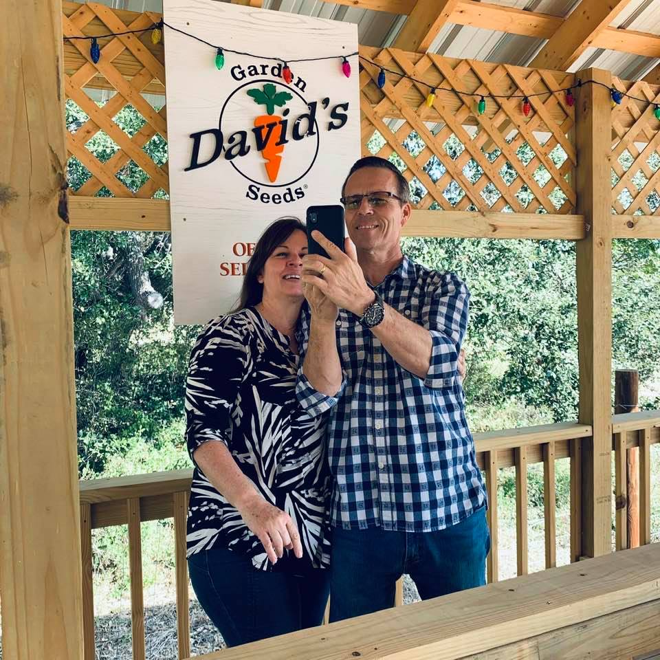 Our good friends, Carolyn & Anthony, in the process of taking a selfie at our official selfie station.