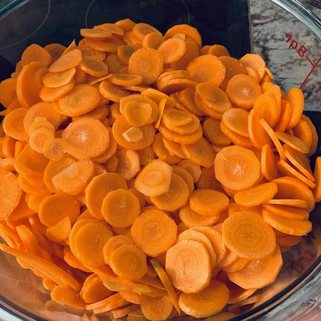 Our carrots were put through our new slicer and they look great!