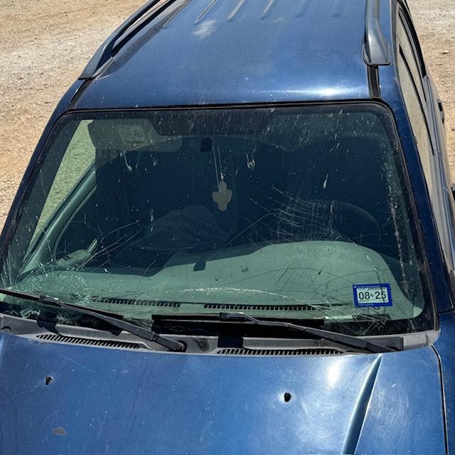 My car windshield is all busted up from this past Sunday when the hood popped up and smashed it while Matt was driving...