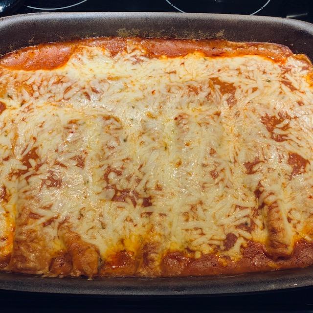 Here are my cheesy enchiladas from tonight. They were very good, made with corn tortillas and beef.