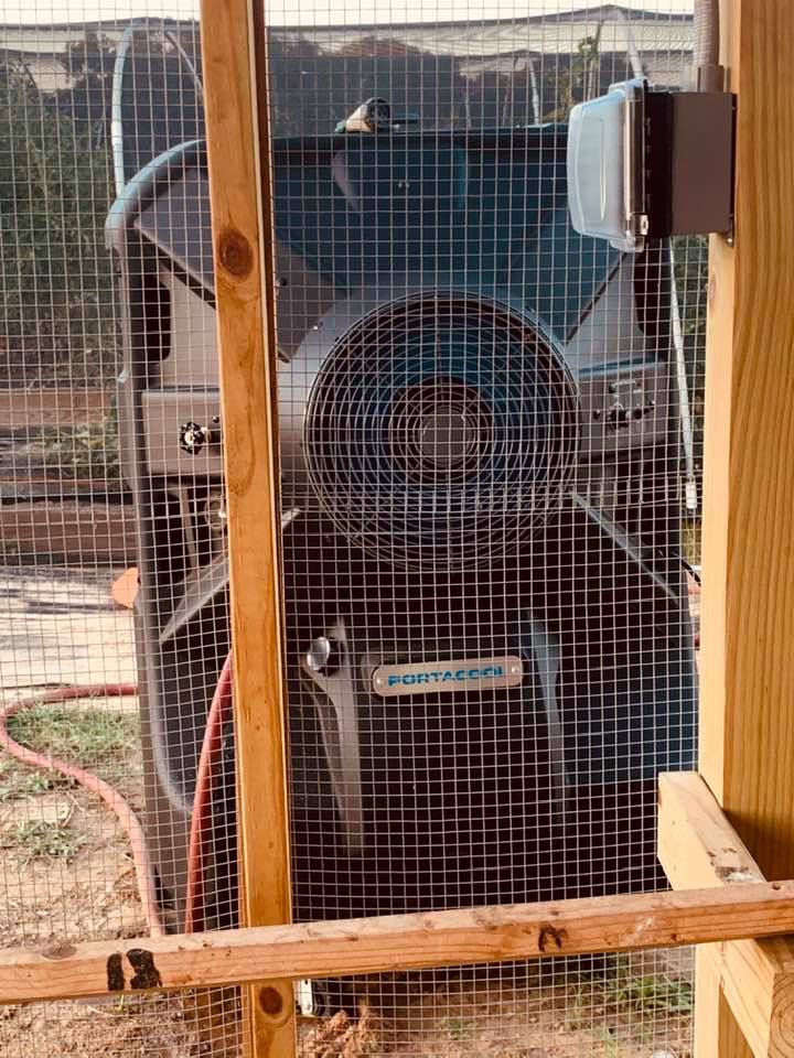 David got an evaporative cooler for the chicks. We fill it with well water and put the fan speed fairly low. It moves the air in the coop with cool air.