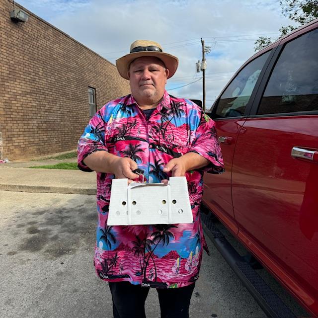 David carried the box of chicks out to the truck. You can fit a lot of tiny chicks into a fairly small box and they were quite active.