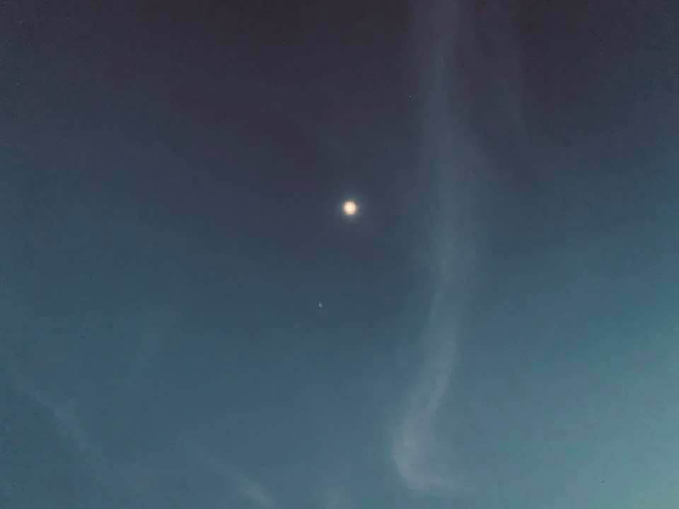 The moon is the bright light showing. Below that is the Christmas Star which is not very bright.