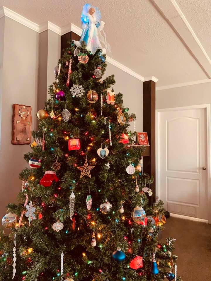 Bethany did a great job putting our tree up next to the fireplace.