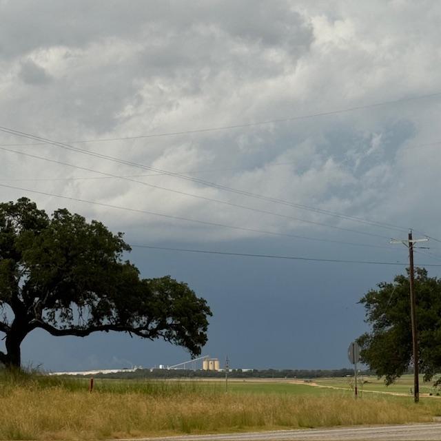 The sand mine that is sort of kitty corner to our farm. It looks very clear on this cloudy day.
