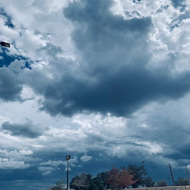 Clouds over Walmart. I ran into a few sprinkles on the way home but that was it. No rain at home.