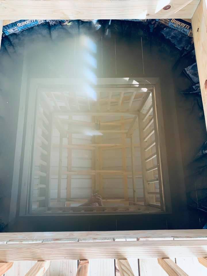 This is the very cloudy pond reflection. They lined it with white river rock today so it needs to settle. Of course, right after, it started pouring so that adds to the cloudy water.