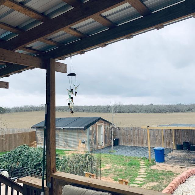 It's fixing to rain today. This is my greenhouse from the back deck as well and the field. We may be purchasing some of it in the spring. It's fixing to rain today. This is my greenhouse from the back deck as well and the field. We may be purchasing some of it in the spring.