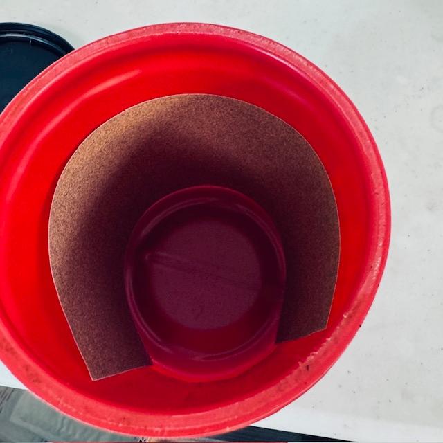 David puts a strip of fine sandpaper inside the coffee can, adds the seeds, adds the lid, and shakes for about 60 seconds. That is really all the help most seeds need.