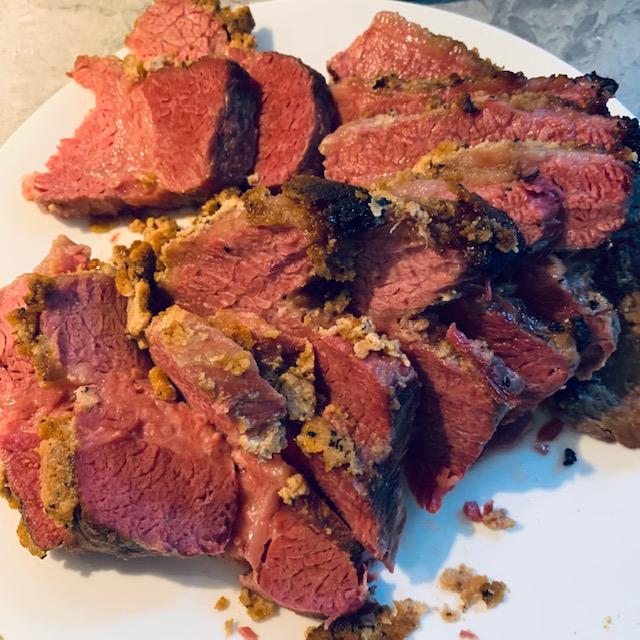 The meat sliced effortlessly. The crust of mustard, brown sugar, and pepper was tasty and kept the juices in.