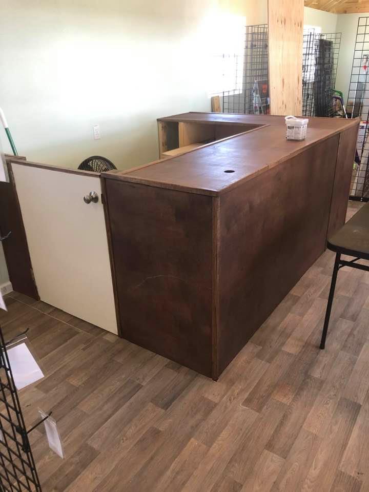 Our finished counter has a half door and a pull out desk for computer work.
