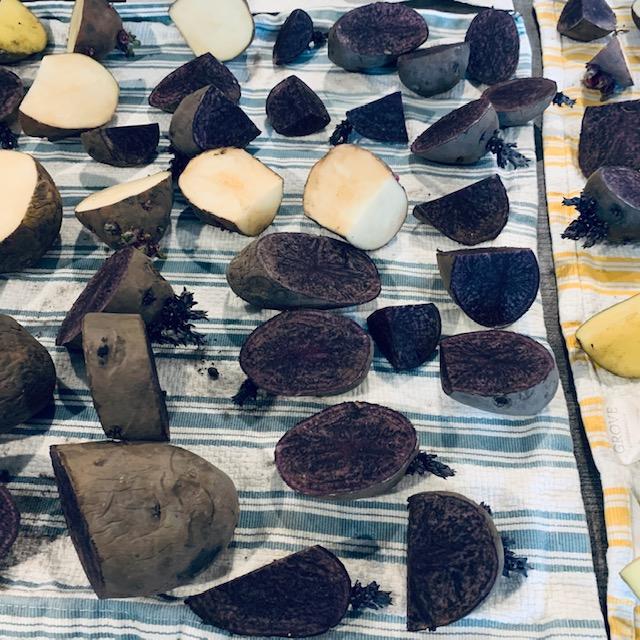 My fingers are a bit stained now from cutting up the purple potatoes.