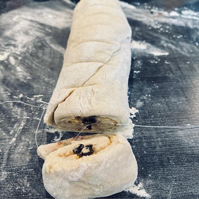 Cutting the rolled up dough was easy using dental floss.