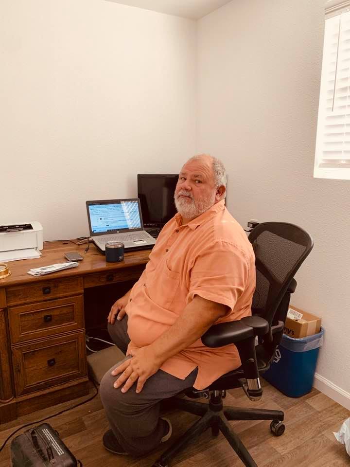 David in his new, tiny office. Close quarters, but at least people are not constantly asking him questions while he is trying to work!