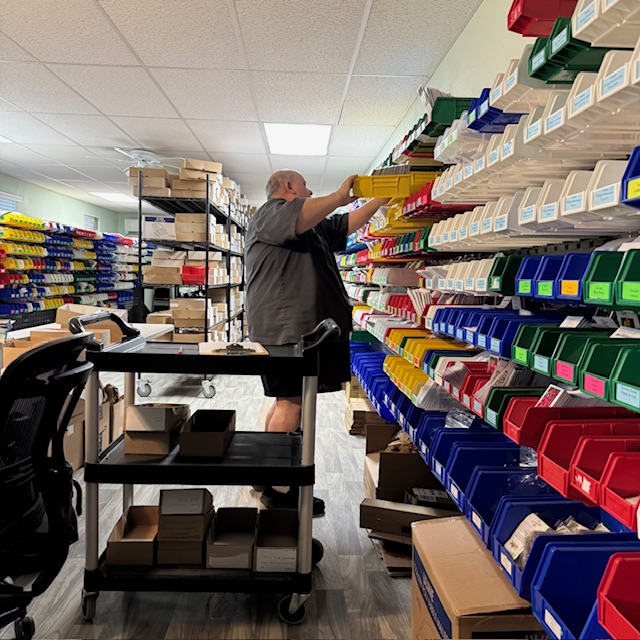 David has been working on the bins and adding new seeds for two days. It is hard work. We have to make room for many new varieties. David has been working on the bins and adding new seeds for two days. It is hard work. We have to make room for many new varieties.