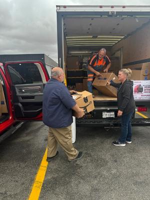 David unloading our truck.