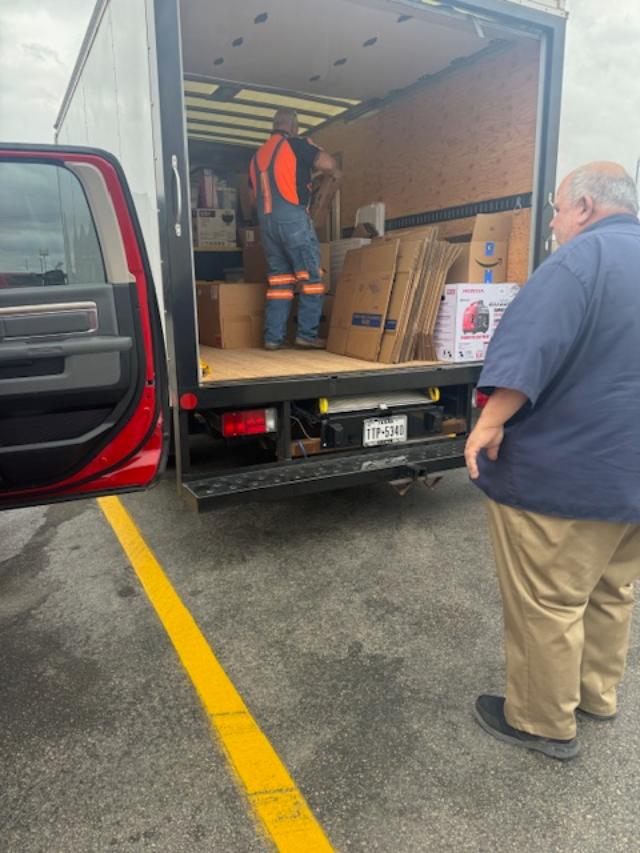 David & Matt got there in good time and unloaded the truck of stuff they brought plus he gave Paul the check of $1000 that our customers helped us with. Thank you.