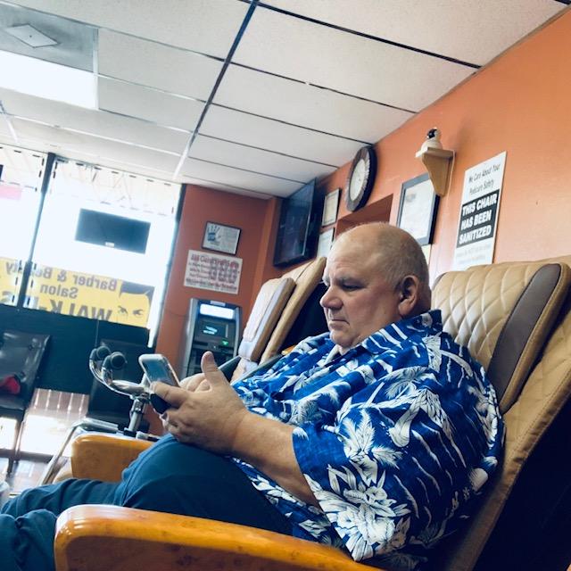 David tries to run his business from his phone when he cannot be there. It is not easy.