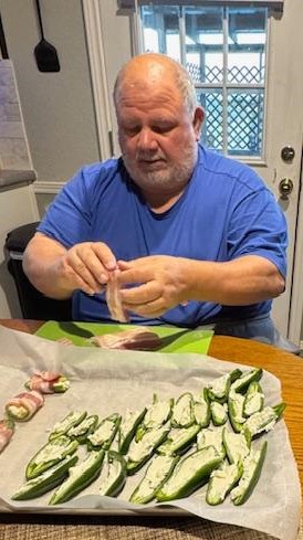 David is making jalapeno poppers--his first time.