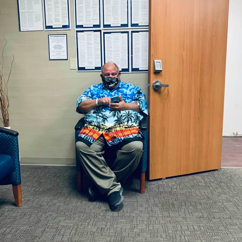 David waiting to be called back for an echocardiogram at Methodist in the cardiology building. They were quick.