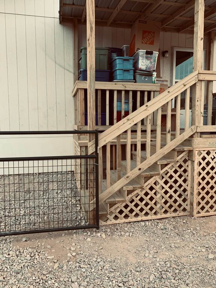 Our new deck with the gate so the dogs don't escape.